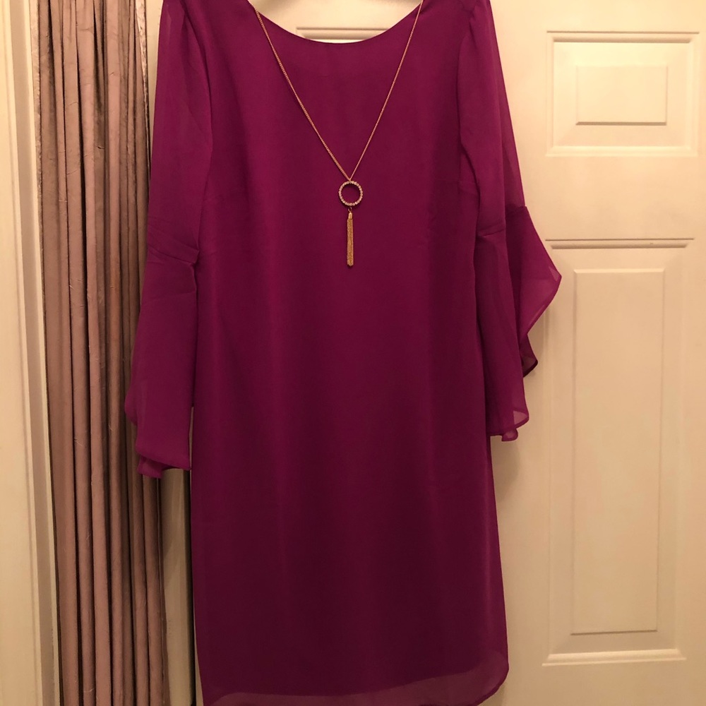 Dress with attached necklace